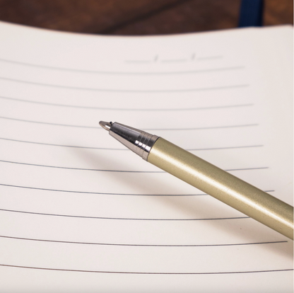 Pen on a sheet of lined paper